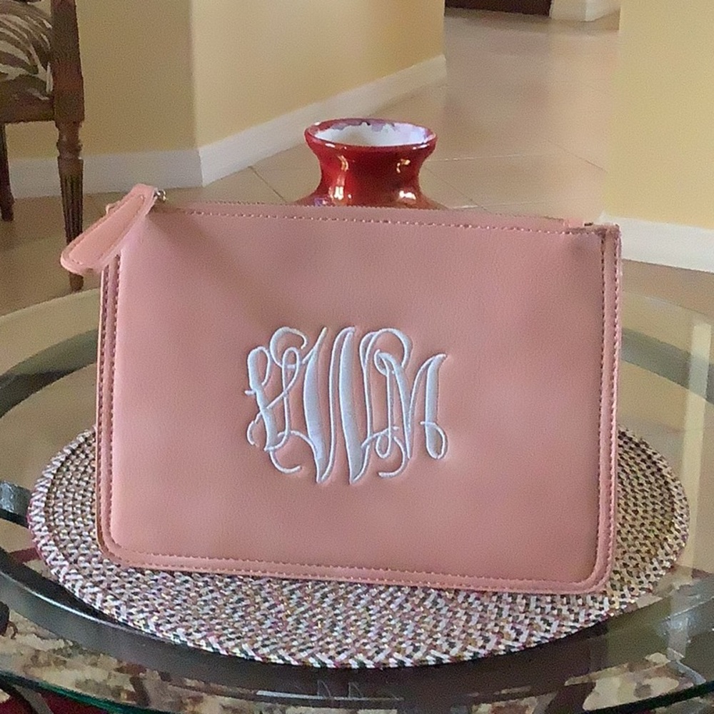Cosmetic bag salmon monogram on the front never used good size 2 pouch z…